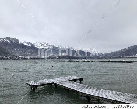 views from the shore of lake annecy after the last snowfall views from the shore of lake annecy after the last snowfall 138398980