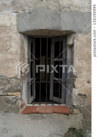 old window of a rural house with its original lattice old window of a rural house with its original lattice 138398999