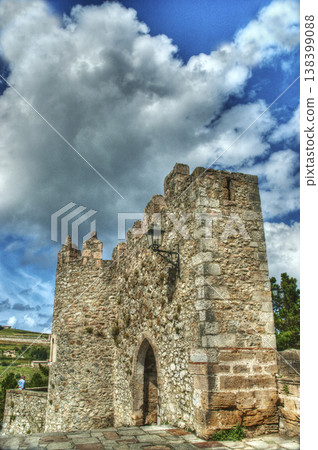 stone gate leading to the walled city stone gate leading to the walled city 138399088