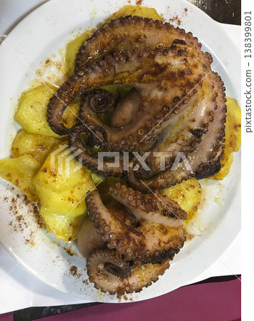 octopus cooked on the grill octopus cooked on the grill 138399801