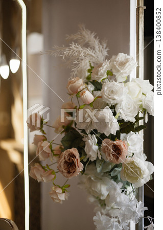 Luxurious White Rose Arrangement Adorned With Pampas Grass And Decorative Ribbon For Upscale Events Luxurious White Rose Arrangement Adorned With Pampas Grass And Decorative Ribbon For Upscale Events 138400852
