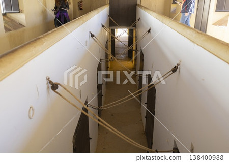 Visitors explore the interior corridors of Plaza de Toros in Ronda, Spain, during a cultural tour on a sunny day in fall Visitors explore the interior corridors of Plaza de Toros in Ronda, Spain, during a cultural tour on a sunny day in fall 138400988