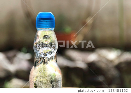 Ramune bottle close-up Ramune bottle close-up 138401162