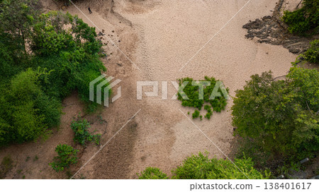 a small beach beside Li Phi Waterfall Lao a small beach beside Li Phi Waterfall Lao 138401617