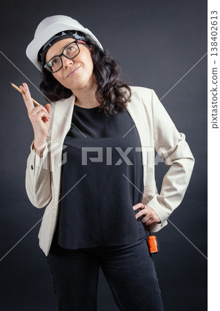 Woman architect engineer thinking with creative idea concept Woman architect engineer thinking with creative idea concept 138402613