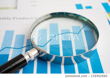 Magnifying glass on charts graphs paper. Financial development, Banking Account, Statistic, Investment Analytic research data economy. Magnifying glass on charts graphs paper. Financial development, Banking Account, Statistic, Investment Analytic research data economy. 138402660
