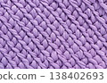 Knitted pattern. Knit background with ornament. Knitted texture. 138402693