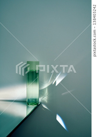 Skincare tonic in glass bottle reflecting light Skincare tonic in glass bottle reflecting light 138403242