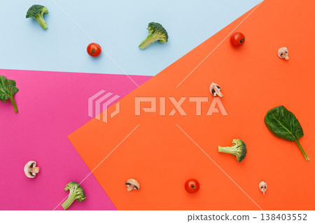Diet, detox and healthy food concept - top view flat lay of fresh organic raw vegetables on abstract bright background. Ingredients for salad - broccoli, mushroom, carrot, cherry tomato, spinach 138403552