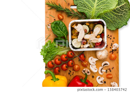Healthy vegetarian food delivery background. Frame of fresh organic vegetables on white. Natural food and wooden cutting board with copy space. 138403742
