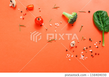 Diet, detox and healthy food concept - top view flat lay of fresh organic raw vegetables on abstract bright background. Ingredients for salad - broccoli, mushroom, carrot, cherry tomato, spinach 138404030