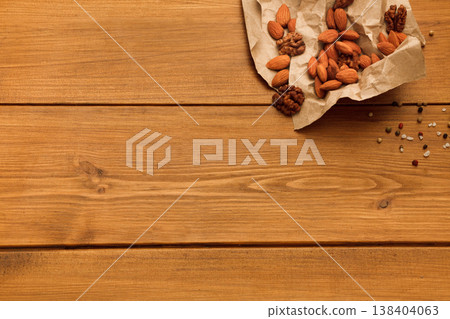 Nuts on rustic wood background. Healthy natural food on table with copy space. 138404063