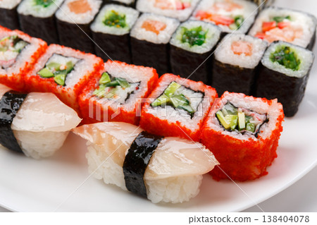 Japanese food restaurant, colorful rolls and sushi platter. Set crop Japanese food restaurant, colorful rolls and sushi platter. Set crop 138404078