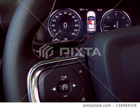 Car dashboard and controls buttons of cruise control on the steering wheel Car dashboard and controls buttons of cruise control on the steering wheel 138404326