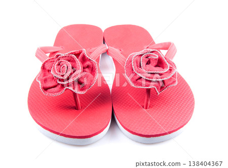 Red summer beach flip flops on a white isolated background. Red summer beach flip flops on a white isolated background. 138404367
