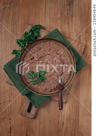 Red bean lobio,a traditional Georgian dish, on a wooden table, homemade, Red bean lobio,a traditional Georgian dish, on a wooden table, homemade, 138404649