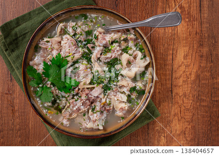 Muzhuzhi, a Georgian dish made from pork legs, with spices and herbs, homemade Muzhuzhi, a Georgian dish made from pork legs, with spices and herbs, homemade 138404657