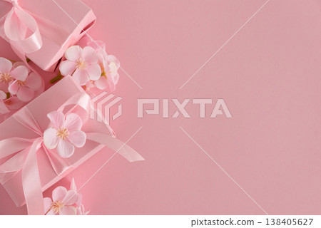 Pink Gift Boxes and Chery Blossom. Romantic Valentines or Mothers Day Flatlay on Soft Pink Background Pink Gift Boxes and Chery Blossom. Romantic Valentines or Mothers Day Flatlay on Soft Pink Background 138405627