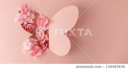 Paper Butterfly Cut Out with Flowers on Pink Background 138405636