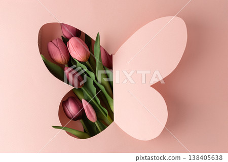 Tulips in Butterfly Cutout on Pink Background Tulips in Butterfly Cutout on Pink Background 138405638