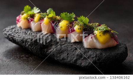 Modernist Sea Bass Tiradito with Citrus Gel and Sea Grapes 138406162