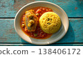 Traditional Barbados Cou-Cou and Flying Fish with Tomato Gravy 138406172