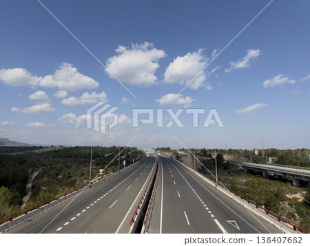 Tranquil Rural Area With Distant City Skyline And Natural Surroundings Tranquil Rural Area With Distant City Skyline And Natural Surroundings 138407682