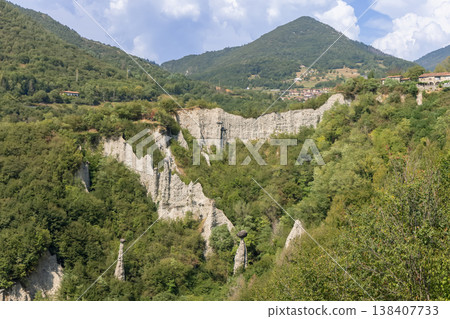 Conical mountain above Zone Rock Pyramids Italy 138407733