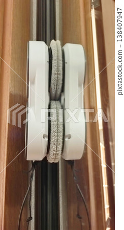 Robot cleaner operates on window tracks to achieve spotless shine without hassle 138407947