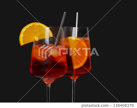 Two Aperol spritz cocktails with orange slice and ice. Two Aperol spritz cocktails with orange slice and ice. 138408370