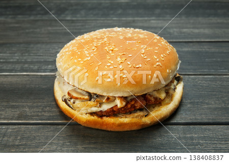Female sportsman cyclist drinks water from the bottle at the race. Riding racing bicycle. Break, stop at road. Woman cycling on countryside summer road or highway. Triathlon or cycling competition. 138408837