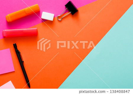 Minimal design. Top view of modern creative workspace with various stationery. Abstract colorful background with copy space Minimal design. Top view of modern creative workspace with various stationery. Abstract colorful background with copy space 138408847