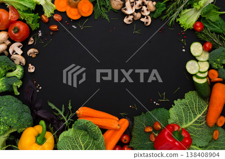 Healthy food background, fresh vegetables. Cooking ingredients for italian cuisine, top view on black Healthy food background, fresh vegetables. Cooking ingredients for italian cuisine, top view on black 138408904