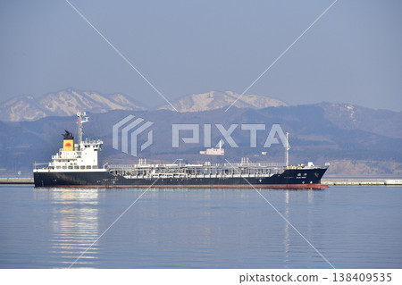 Photographing the scenery of a cargo ship entering Hakodate Port in Hakodate City, Hokkaido in spring 138409535
