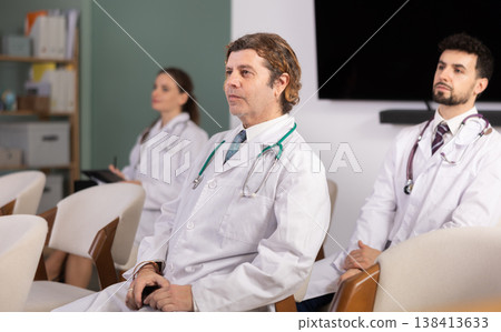 Lecture or meeting medical participants listen to speaker Lecture or meeting medical participants listen to speaker 138413633