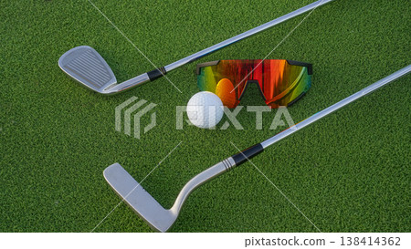 Close up of golf equipment on green grass. Close up of golf equipment on green grass. 138414362