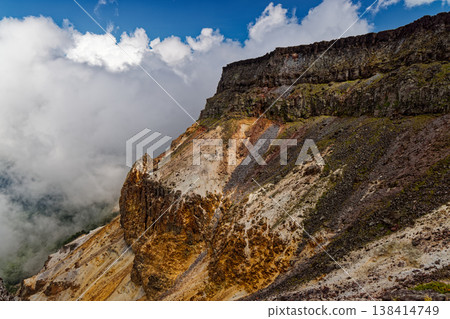 Clouds gather around the explosive crater of Mt. Iou in the Yatsugatake mountain range. 138414749