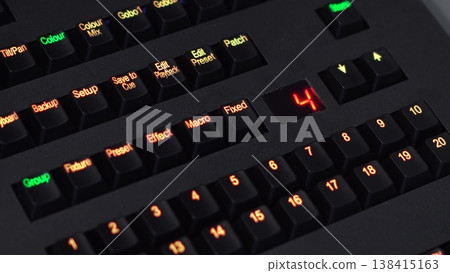 Finger Pressing Arrow to Change Lighting Console Preset in 4K 138415163