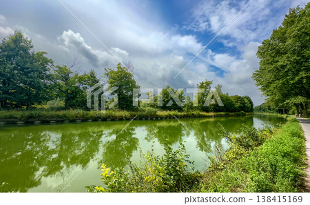 Rijkevorsel, Antwerpse Kempen, Belgium, Overcast skies merge with tranquil water and striking color Rijkevorsel, Antwerpse Kempen, Belgium, Overcast skies merge with tranquil water and striking color 138415169