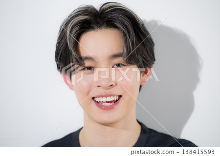 Close-up of a young man's mouth, lips, teeth alignment and whitening, and smile. Close-up of a young man's mouth, lips, teeth alignment and whitening, and smile. 138415593