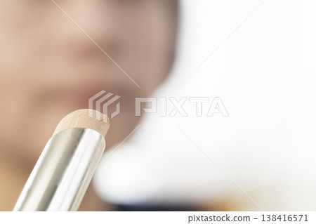 Apply makeup with makeup tools Apply makeup with makeup tools 138416571