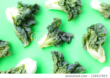 Fresh baby bok choy with crisp white green leaves. Fresh baby bok choy with crisp white green leaves. 138417053