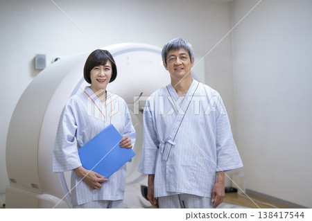 Men and women in their 60s undergoing a health checkup. Men and women in their 60s undergoing a health checkup. 138417544