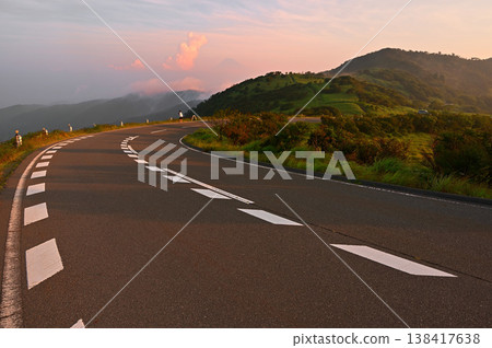 The Izu Mountain Ridge Trail on the Izu Peninsula: A view of Mt. Fuji and Mt. Kodaruma at sunrise from the West Izu Skyline. The Izu Mountain Ridge Trail on the Izu Peninsula: A view of Mt. Fuji and Mt. Kodaruma at sunrise from the West Izu Skyline. 138417638
