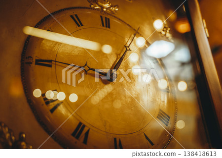 Vintage Antique Clock Face with Roman Numerals and Warm Lighting Vintage Antique Clock Face with Roman Numerals and Warm Lighting 138418613