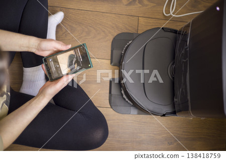 Automated Cleaning With Mobile Control. Advanced Home Automation System With Robotic Vacuum And Userfriendly Smartphone Interface For Hardwood Floor Maintenance Automated Cleaning With Mobile Control. Advanced Home Automation System With Robotic Vacuum And Userfriendly Smartphone Interface For Hardwood Floor Maintenance 138418759