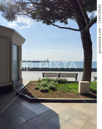 Sunny coastal view from walkway 138419082