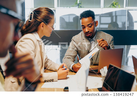 Mentor Aids Review. Experienced Mentor Supports Colleague Through Review And Feedback Session Mentor Aids Review. Experienced Mentor Supports Colleague Through Review And Feedback Session 138419247