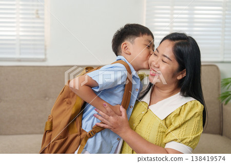 Mother and son sharing a loving moment before school 138419574