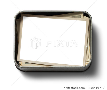 A composite image of old photographs in a tin box. A composite image of old photographs in a tin box. 138419712